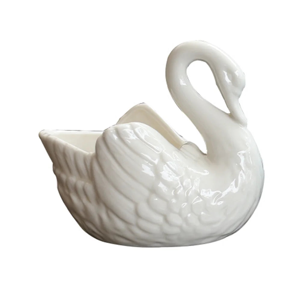 Ceramiczna doniczka łabędź do domu którą postawisz wszędzie