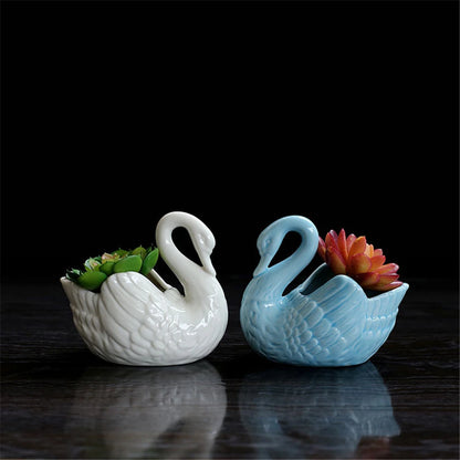 Ceramiczna doniczka łabędź do domu którą postawisz wszędzie